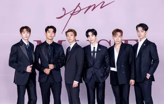The six members of 2PM posing in official promotional images for "THE RETURN."